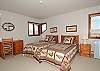 Another upstairs bedroom with twin beds
