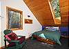 Upstairs loft with a queen bed