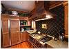Large stove top in kitchen