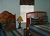 1 twin bed and 1 full size bed