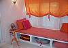 The day bed in the reading area makes this an area to relax, nap or even sleep a child or small adult