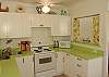 This fully stocked and completely renovated kitchen has everything you need. And where else but Tybee can you cook in a lime green kitchen!