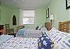 We have two bedrooms on the first floor. This is the bedroom with the 2 twin beds.