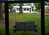 This view shows the cottage in the backround along with the picnic table.