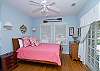 This bedroom also includes the master bath as well as a door that leads out to the screened porch.  Cable TV as well