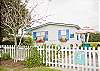 Cottage charm with window boxes, native plants and shutters.  Just how a cottage is supposed to look on Tybee Island!