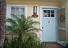 The main entrance to the cottage is the side door by the back patio. But as you can see, the front door is very welcoming!