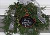 This hangs over the front door to welcome all our guests during the Christmas season!  A frying pan- what else!