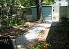 The back yard has new seating, new flower and is great space to relax!