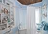 The master bathroom has a claw-foot bathtub ( with shower and shower curtain). This bathroom is just off the master bedroom and full of wonderful bath salts and special details.