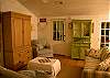 The room has lots of comfy seating to relax and enjoy!