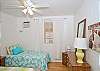 Bedroom #1 - one double and one twin bed to fit various sleeping needs.  Bright, beachy colors made this room a sunny getaway on it's own!