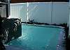 This wonderful pool features a crab fountain constantly blowing water into the pool! What a fun addition to the cottage!