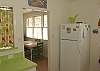 The dining room table is visible from the kitchen.