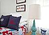 Our cheerful bedroom! Red, white and nautical blue!  One double and one twin bed.