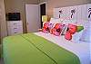 We love this king bedroom. So bright, cheerful!