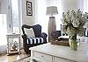 Our living room is full of Paula's new furniture  - sturdy and stylish for the beach house.