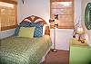 Another view of the queen bedroom. There are two queen bedrooms.