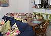 The table seats 6 people. The bar stools seat an additional 3 people.