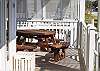 This picnic table is located just to the right of the front doors. The table can seat up to 8 guests and just the right place to enjoy the breezes from the ocean.