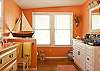 This master bathroom is on the 1st floor and right off the master bedroom.