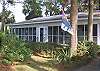 The entire front of the cottage is screened. Excellent for watching sunsets and people watching.