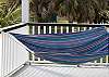 The hammock is right on the corner of the wrap around porch.  Just waiting for you to come and relax and enjoy!