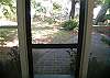 Looking out from the screened porch to the outside garden.