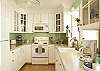The cool clean kitchen is completely equipped and just the right size to have a helper and whip up fat juicy burgers for the grill out back.