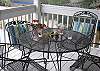 The screened porch is ideal to enjoy a meal or your morning coffee.