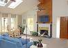 The large screen TV and working fireplace.