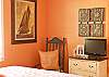 The tv in the 1st floor master bedroom.