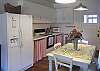 Large and roomy with everything you need to cook a full family meal! The kitchen table seat 4-6 people. There is also a dining room table in the living room/ dining room which seats 6-8 people.