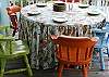 How much fun is this! Sitting outside enjoying the fresh air on the front porch.  These brightly painted chairs make things even more fun!