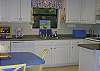 The kitchen area is part of the great room and fully equipped and furnished. Everything you need to prepare any type meail.