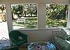 The screened porch overlooks the marsh. It's so bright and cheerful!