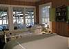 The Queen Bed, the twin bed looking out to the screened porch. The dock is outside the screened porch window as well.