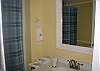 One of three full bathrooms.