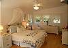 Decorated in soft english florals with heart of pine floors.
