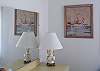 We found some great vintage pictures which perfectly fit this home and bedroom.