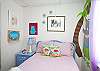 Upstairs bedroom #1:  features a double bed and fun wall art; lavender and blue color scheme!