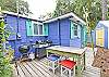 Back deck equipped with gas &amp; charcoal grills and picnic table.  Enjoy partial marsh views from the deck!
