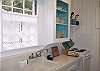 Bright and tidy, this kitchen makes for a cheery place to make a meal!