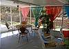 The porch has seating, dining area seating and still room to play.