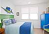 Another view of second bedroom with queen bed.