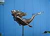 Mermaids abound at this vacation home! Every where you look you'll see one! This special girl lives outside in the garden.
