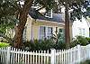 Our cottage is located on a corner lot. Very easy  walk to the beach, restaurants, even one of our favorite fresh seafood markets!