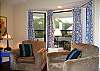 This is the living room looking out to the screened porch.