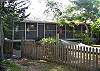 Screened Inn has a wonderful fenced yard and hammock to relax.
