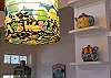 The kitchen is full of Englis Tea pots and bright and cheerful features like this kitchen light!